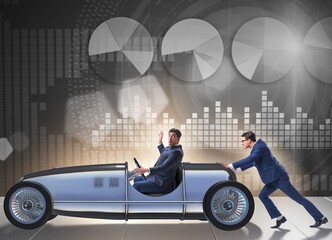 Businessman car pushing in teamwork concept