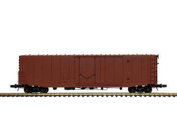 A Brown Railroad Box Car On Train Track