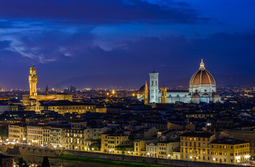 Night view of Florence, Palazzo Vecchio and Florence Duomo, Italy. Architecture and landmark of Florence. Night cityscape of Florence.