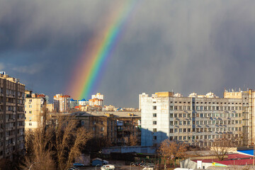 Scenic view of the rainbow in the big city. February, Kyiv Ukraine. 