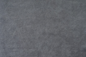 Texture background of velours gray fabric. Upholstery velveteen texture fabric, corduroy furniture...
