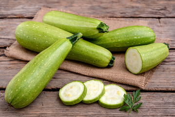 Zucchini on a wooden background