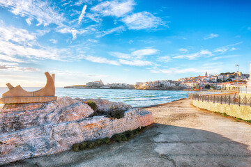 Fototapeta premium Marvelous view of historic center and promenade of the city of Vieste at sunrise