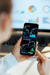 Business woman analysing business investment market