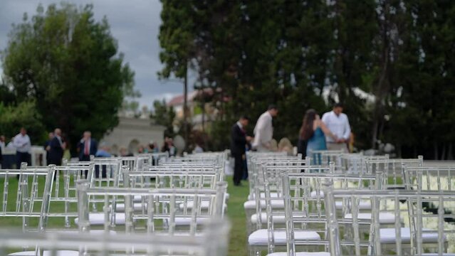 Guests arriving to wedding event and making photos of venue