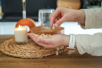 Woman, hand with vitamins and pills for medicine for depression, anxiety or mental health stress