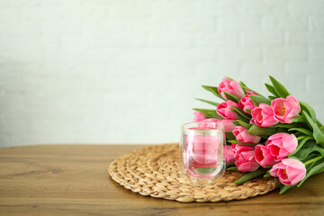 Glass of water and bunch of flowers, good morning concept