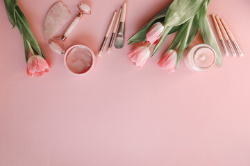 Top view cosmetic set, makeup brushes, eye patches, face roller