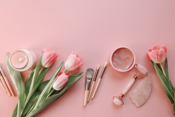 Top view cosmetic set, makeup brushes, eye patches, face roller