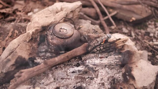 Kettle in the camp fire