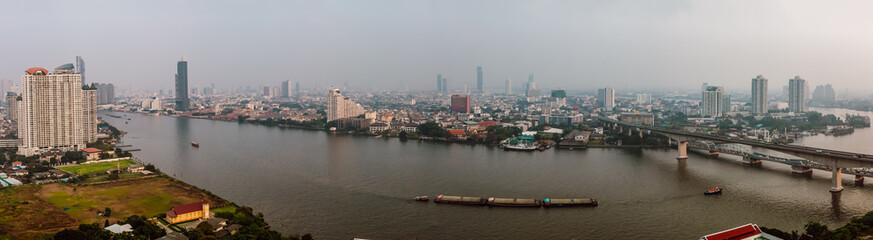 Naklejka premium Panorama of the skyline of Bangkok with the big river