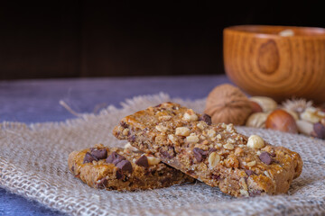 Nuces of nuts, hazelnuts, peanuts and chocolate