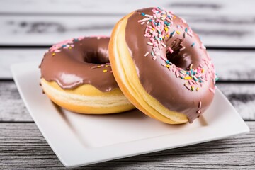 donut with chocolate icing and sprinkles