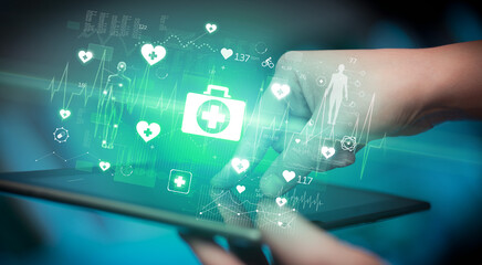 Close-up of a touchscreen with healthcare icons