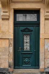 View of old building with green door