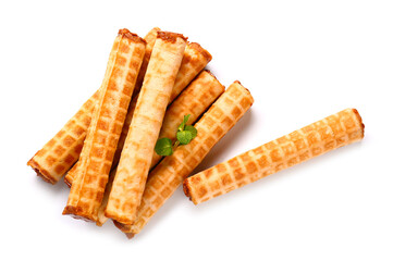 Delicious of wafer rolls with boiled condensed milk and mint isolated on white background