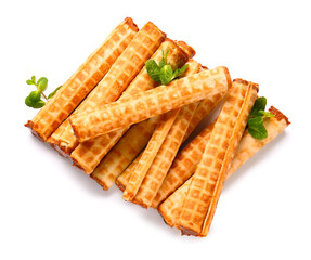Delicious of wafer rolls with boiled condensed milk and mint isolated on white background