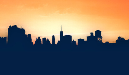 New York City skyline buildings form silhouette shapes against the yellow background sky in Manhattan NYC