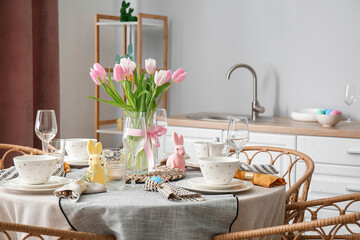 Interior of kitchen with table served for Easter celebration