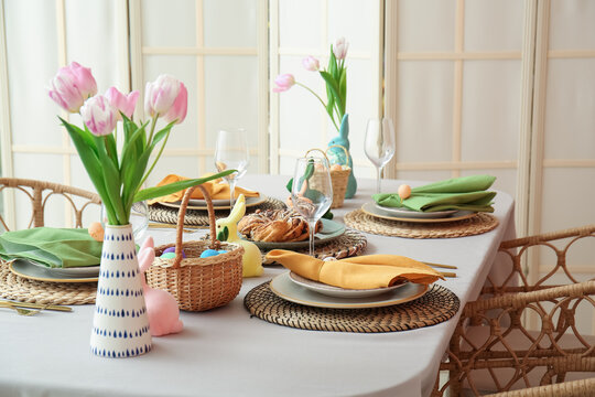 Festive table served for Easter celebration in dining room