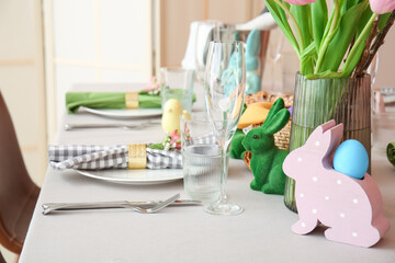 Beautiful table setting for Easter celebration in dining room