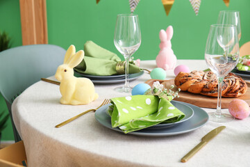 Beautiful table setting for Easter celebration in dining room