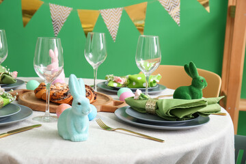 Beautiful table setting for Easter celebration in dining room