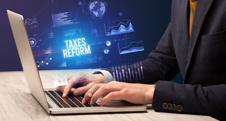 Businessman working on laptop, business concept