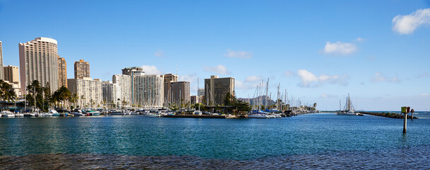 Fototapeta premium Skyline view of Ilikai Harbor and Honolulu, Hawaii looking East