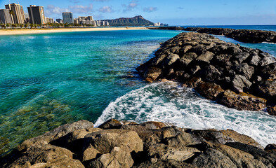 Wave Break in Canal opening with View of Diamond Head Crater  taken from Ala Moana Beach Park,...