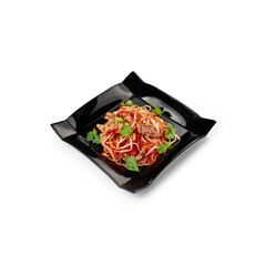Wok in Chinese sauce on a flat black plate white background isolate