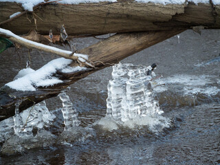 icicles over river water close up