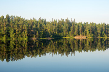Fototapeta na wymiar reflection on the forest lake