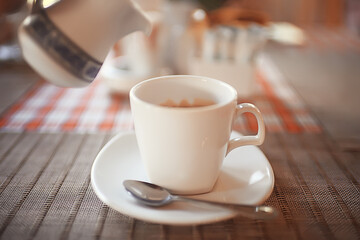 a cup of coffee in a cafe, photo morning coffee luvak cappuccino