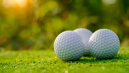 Green grass with golf ball closeup in soft focus when sunlight Playground for golf course concept