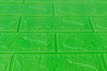 Closeup view of a green foam bricks wall background
