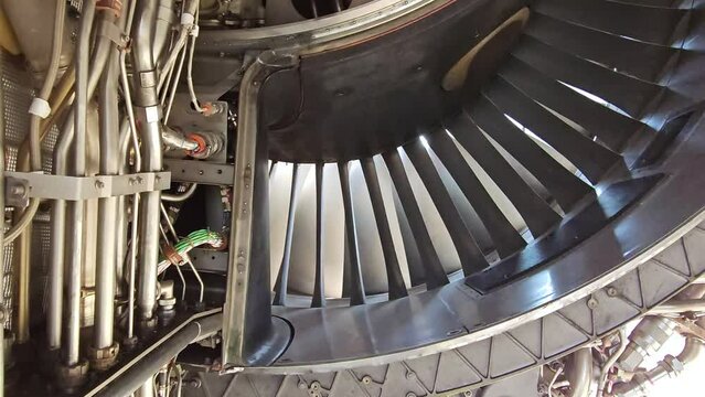 Blades of turbine engine airplane rotating,Industry aviation and transportation.