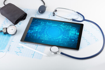 Close-up view of a tablet pc with medical abbreviation
