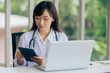 Doctor using online health consulting on computer pc and digital tablet, Tele medical healthcare...