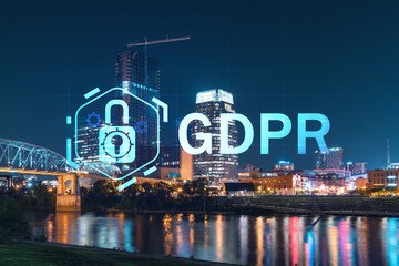 Panoramic view of Broadway district of Nashville over Cumberland River at illuminated night skyline, Tennessee, USA. GDPR hologram, concept of data protection regulation and privacy for individuals