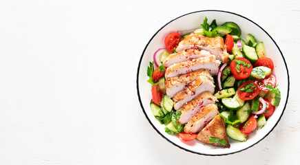 Fototapeta na wymiar Salad with chicken meat. Fresh vegetable salad with chicken breast. Meat salad with chicken fillet and fresh vegetables on plate.