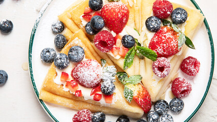 Healthy breakfast, homemade traditional crepes or pancakes