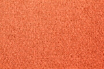 Abstract design background of dark orange coarse-grained intersection texture of rough fabric with...