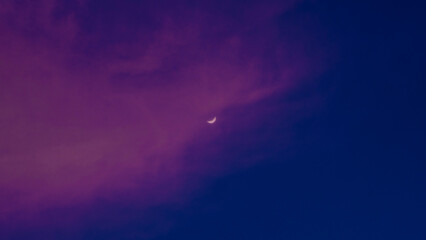 Fototapeta na wymiar moody clouds and the moon