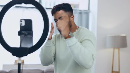 Live streaming, influencer and vlogger with man and video recording for social media, blog and channel. Content creator, technology and internet with guy at home for subscribers, online and tutorial