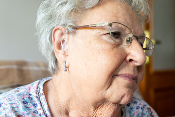 woman wearing digital hearing aid