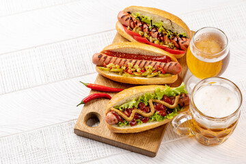 Various hot dog and beer