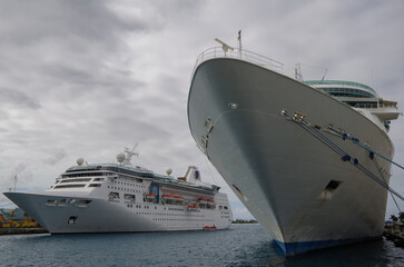 Modern white Royal Caribbean cruiseships or cruise ship liners Empress and Enchantment in port of...