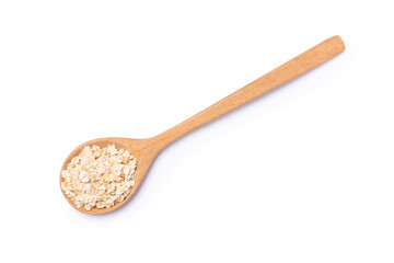Oat flakes in wooden spoon isolated on white background
