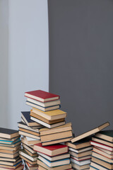 a large number of books on a gray white background in the library of science knowledge reading